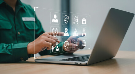 Man Using Virtual Safety Interface On Laptop Screen