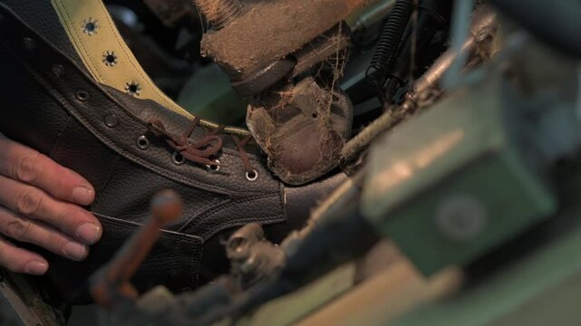close-up of leather shoe sewing in a factory. Shoe sewing machine