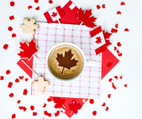 Enjoying a cozy coffee break with Canadian pride surrounded by festive decorations at home