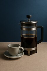 French press, coffee cup and coffee
