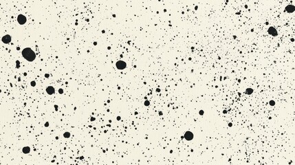 Abstract ink splatters on a light beige background.
