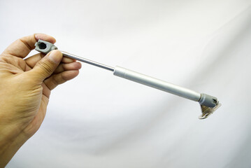 Piston for furniture and overhead doors