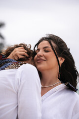 Romantic scene with man and woman in love, beautiful couple outdoors