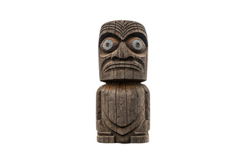 Wooden carved totem figure with wide eyes, geometric patterns and traditional indigenous design elements, isolated on a transparent background
