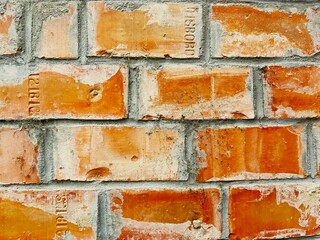 Old building brick structure with numbered bricks.