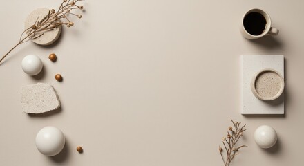 Fototapeta premium A beige aesthetic workspace arrangement featuring coffee, dried plants, and geometric shapes