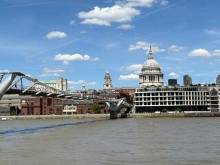 St Pauls Cathedral and Millennium Bridge which spans the River Thames, it is a pedestrian bridge taking people from the South of the river to the North. It is also known as the wibbly wobbly bridge