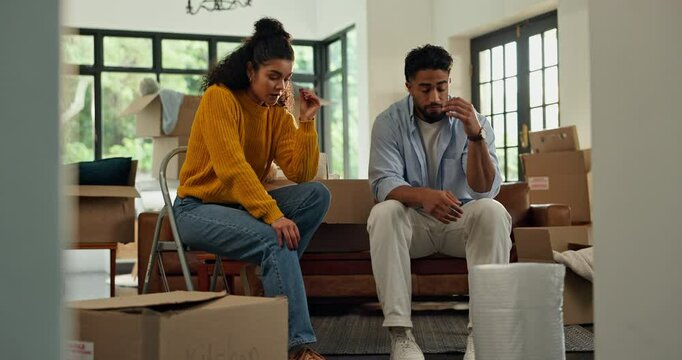 Eviction, moving house and upset with couple in living room of home together for financial crisis. Bankruptcy, debt and mortgage with unhappy people in apartment for lease or loan termination