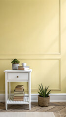 A classic interior showcases a white side table adorned with books and plants against a soft yellow wall