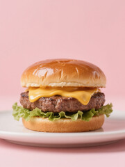 Delicious cheeseburger with melted cheese, fresh lettuce, and a glossy bun on a white plate against a pastel pink background.