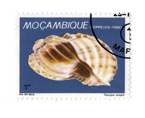 A vintage postage stamp from Mozambique isolated on a white background.