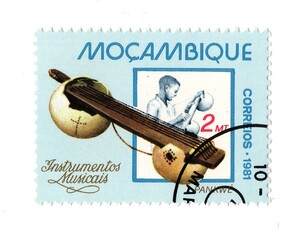 A vintage postage stamp from Mozambique isolated on a white background.