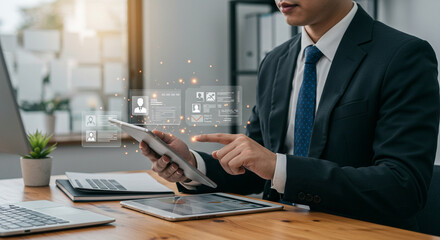Seamlessly managing employee data and recruitment with a tablet, showcasing a high-tech business concept.