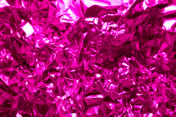 Vibrant pink foil texture creates a striking visual effect suitable for artistic and decorative...