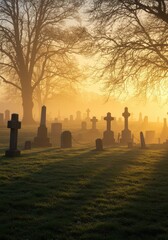 A foggy graveyard at dawn, where tombstones and trees appear in silhouette beneath the gentle sunrise glow.
