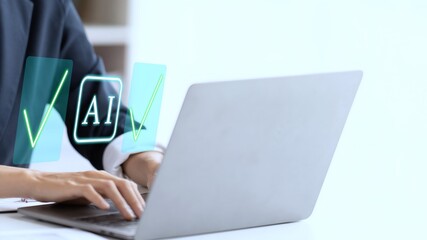 A person using laptop with approved AI symbol on virtual screen for check mark AI.