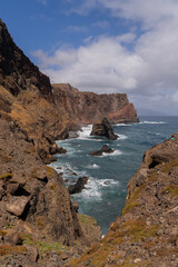 Dramatic rocky cliffs with crashing waves