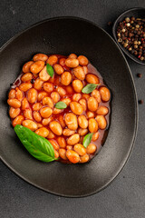 Bean stew tomato sauce cranberry beans vegetable dish beans borlotti fresh delicious gourmet food background on the table rustic food top view copy space keto and paleo diet vegan and vegan food