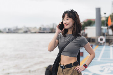 Happy solo Southeast Asian woman teenager blogger world travel tourism. Local cultural experience...