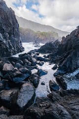 Natural Swimming Pool Between Volcanic Rocks With Ocean Waves, Dramatic Cliffs In Sao Jorge Island....