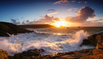 Fototapeta premium serene and wild sunrise over a rugged cornish coast with roaring winds and dynamic surf in an epic maritime adventure