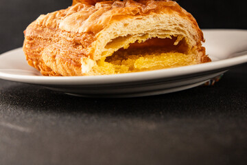 Triangle cake almond puff pastry sweet dessert fresh delicious gourmet food background on the table rustic food top view copy space