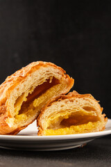 Triangle cake almond puff pastry sweet dessert fresh delicious gourmet food background on the table rustic food top view copy space