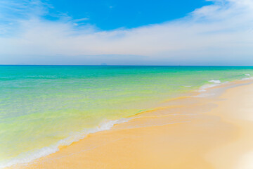 Turquoise sea and white sand. 

Wild beach at Cam Ranh in Vietnam. White sand dunes and turquoise water in the sea. 