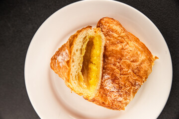 Triangle cake almond puff pastry sweet dessert fresh delicious gourmet food background on the table rustic food top view copy space