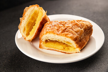 Triangle cake almond puff pastry sweet dessert fresh delicious gourmet food background on the table rustic food top view copy space