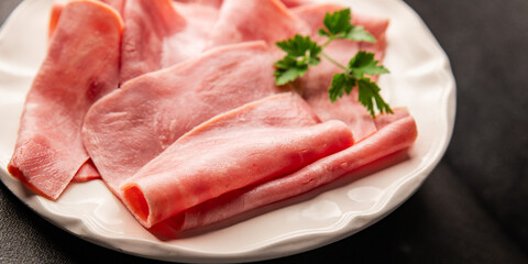 Ham slices meat spam pork fresh delicious gourmet food background on the table rustic food top view...