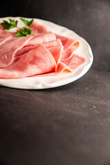 Ham slices meat spam pork fresh delicious gourmet food background on the table rustic food top view copy space