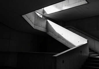 Fototapeta premium Concrete Staircase with Skylight in Black and White