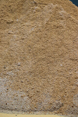 Construction sand material, used with cement and water to form concrete