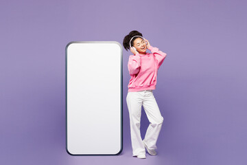 Young woman wears pink hoodie casual clothes big huge blank screen mobile cell phone smartphone...