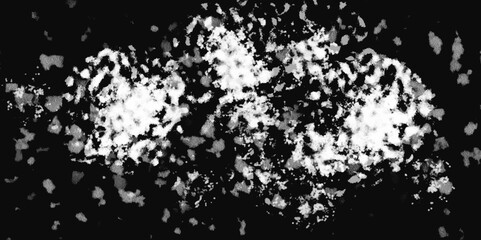 Obraz premium White snowflakes on a black background surface. Macro nature pattern backdrop. Snow overlay background isolated on black. Winter concept. scratches and cracks which can be used as a background.