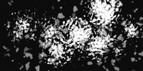 White snowflakes on a black background surface. Macro nature pattern backdrop. Snow overlay background isolated on black. Winter concept. scratches and cracks which can be used as a background.