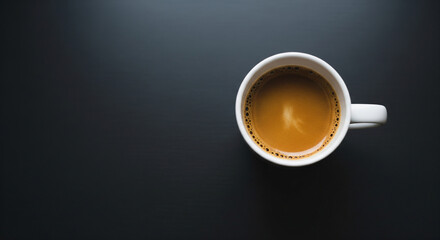 Photo of a closeup, topdown view of a steaming cup of rich espresso coffee with crema, set against a dark, textured background, evoking warmth and energy