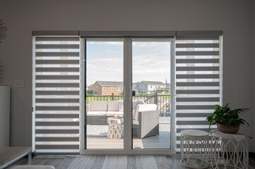 Bright living room with sliding door and view outside