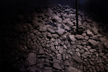pile of coal, natural fuel for heating and energy, cost of a ton of coal, environmental problem
