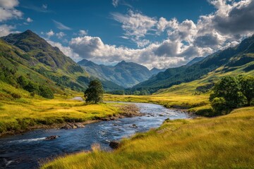 Fototapeta premium River flows through valley in Scotland, cloudy sky; for travel, relaxation, tourism