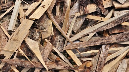 Pile of firewood. Energy resources, fuel. Natural patterns. Abstract background. Wood industry