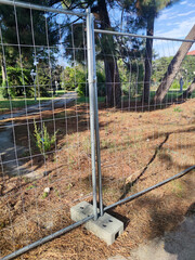 Close-up of metal mesh fences in a park