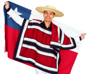 Smiling chilean man wearing traditional Huaso blanket and straw hat Chupalla holding chile flag, celebrating national holiday Fiestas Patrias