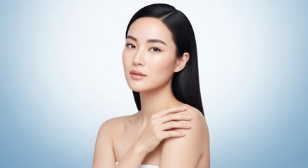A beautiful young asian woman with long dark hair and clear skin, looking thoughtfully to the side