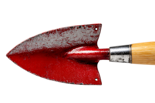 Close up of a rusty red garden trowel.