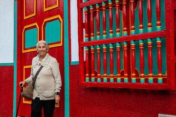 Senior woman at the beautiful colonial town of Concepcion located in the department of Antioquia in...