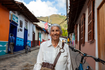 Senior woman at the beautiful colonial town of Concepcion located in the department of Antioquia in...