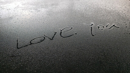 On a black background, the words 