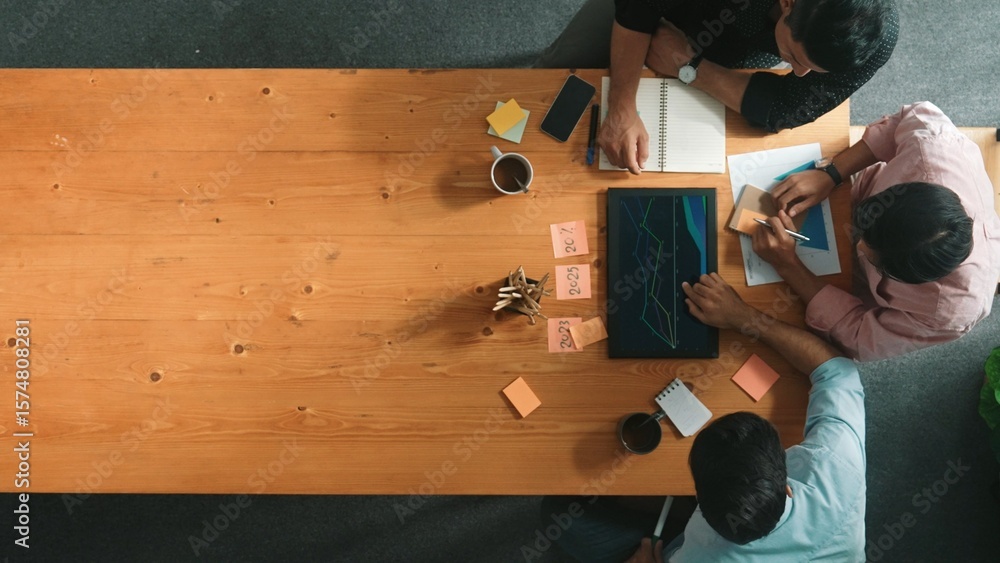 Poster group of diverse people sharing idea while writing at colorful sticky notes. top down view of smart 
